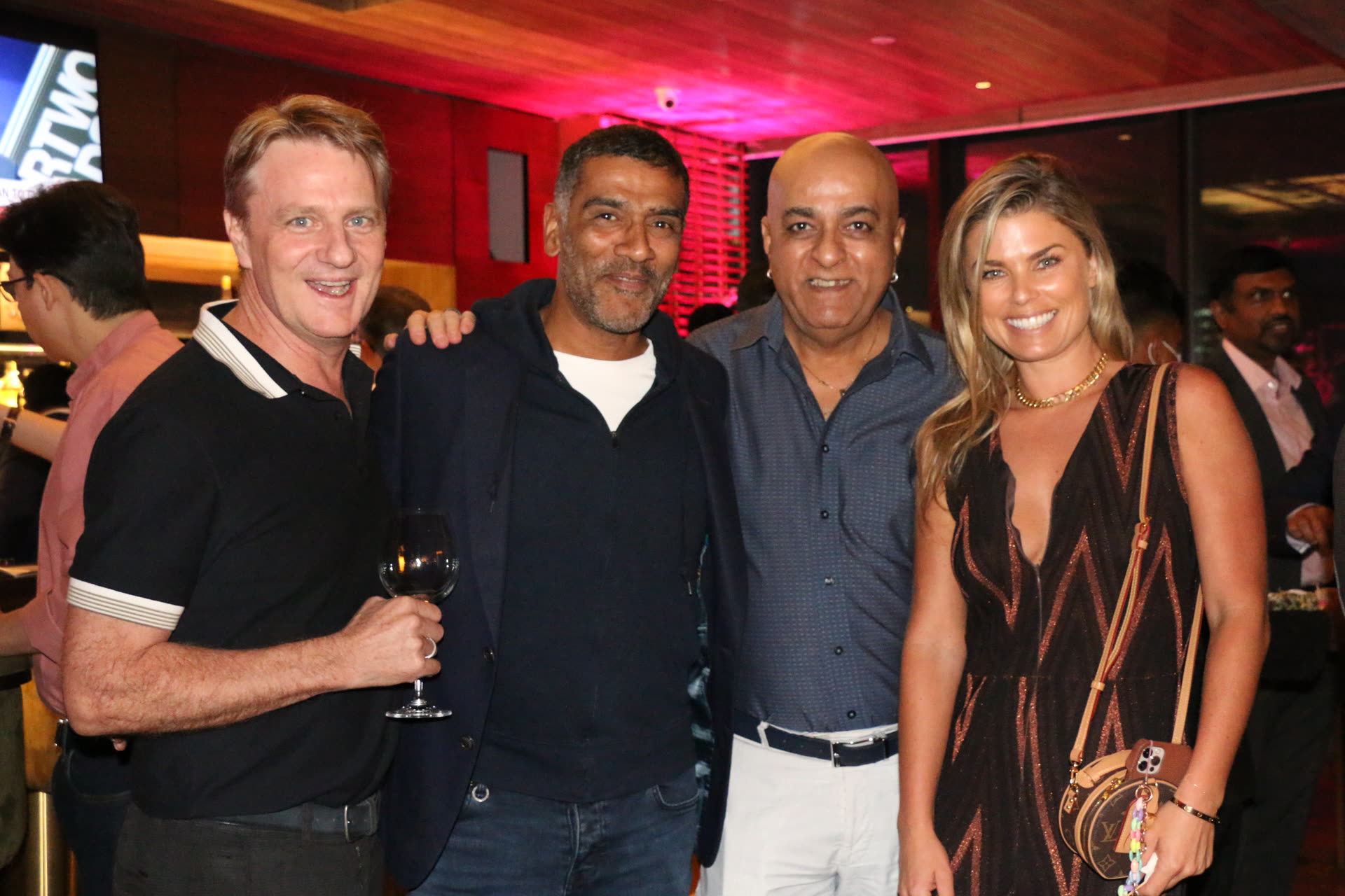 Members raising a toast together at a Club evening