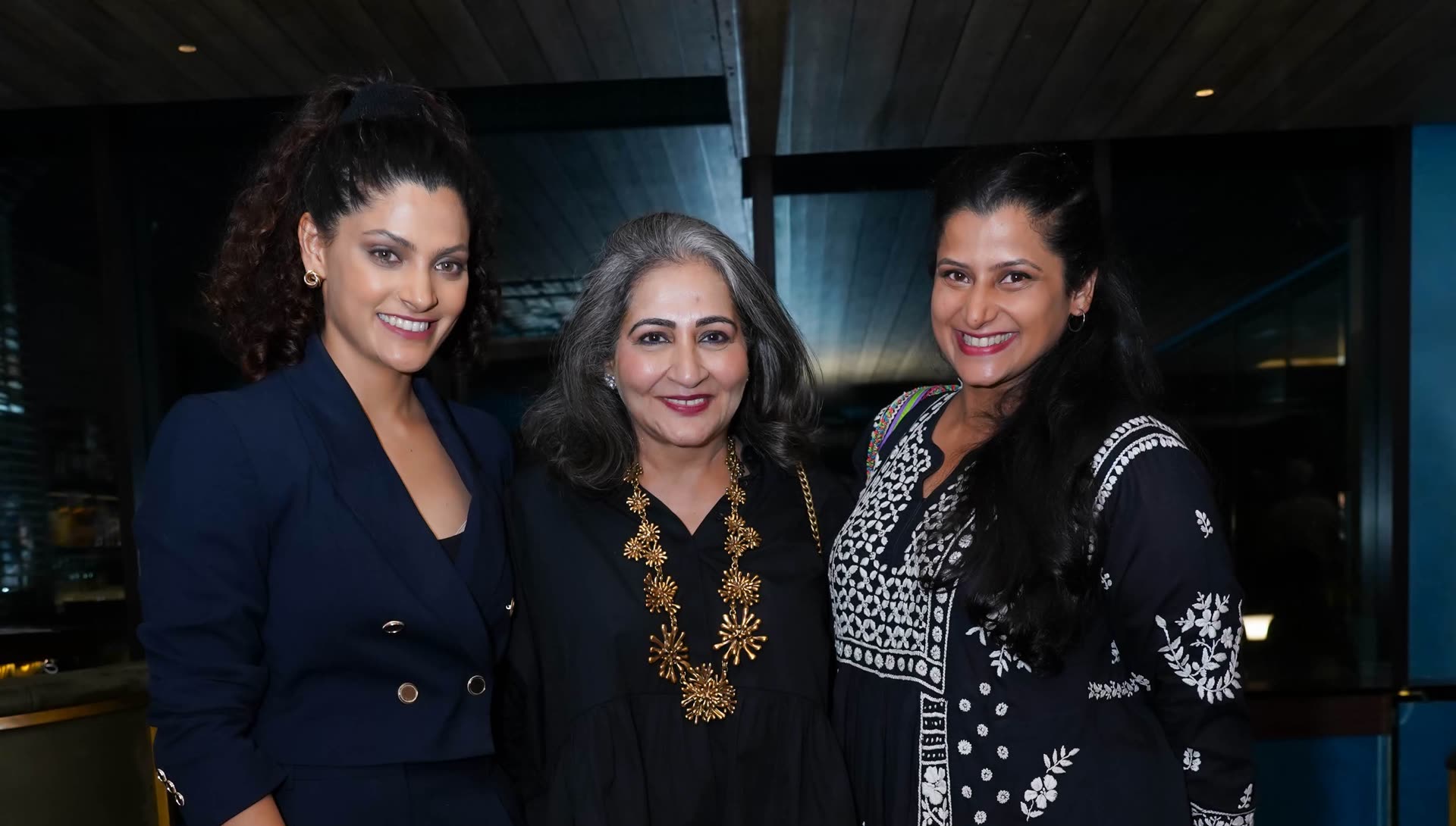 Members smiling together at a private Club evening